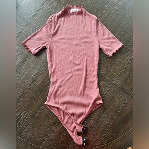 Never worn XS pink short sleeve bodysuit